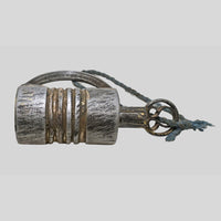 antique gold-tone ribbed metal padlock with original key, additional angle