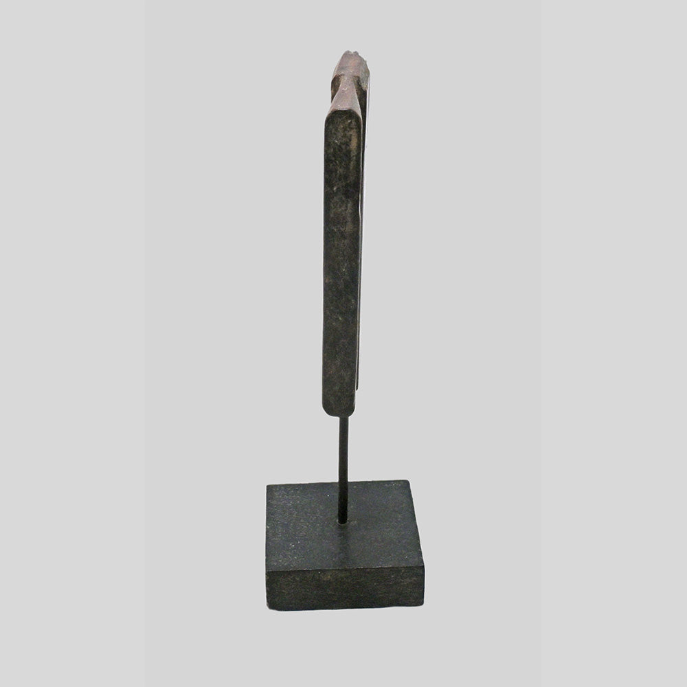 Wooden textile printing block showing its carved surface