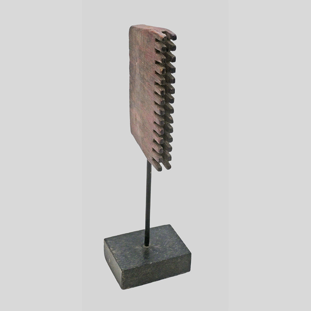 Second view of wooden printing block on stand