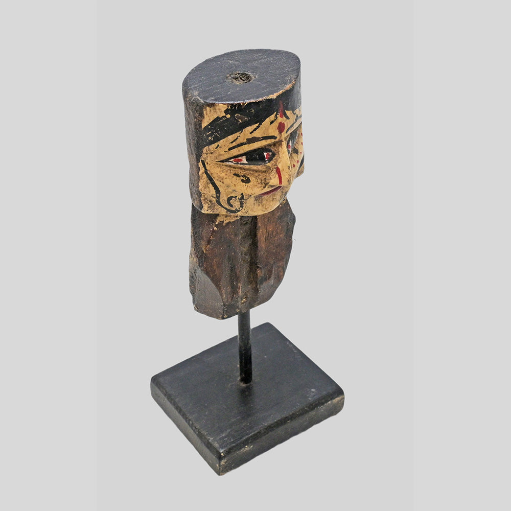 Wooden queen bust figurine, angled view