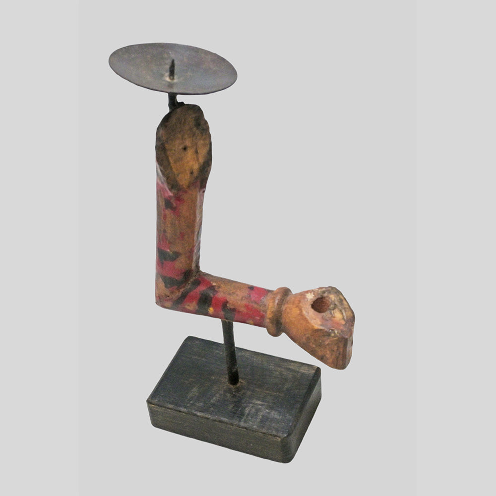 Wooden folk art candle holder, angled view