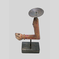 Wooden folk art candle holder, side view