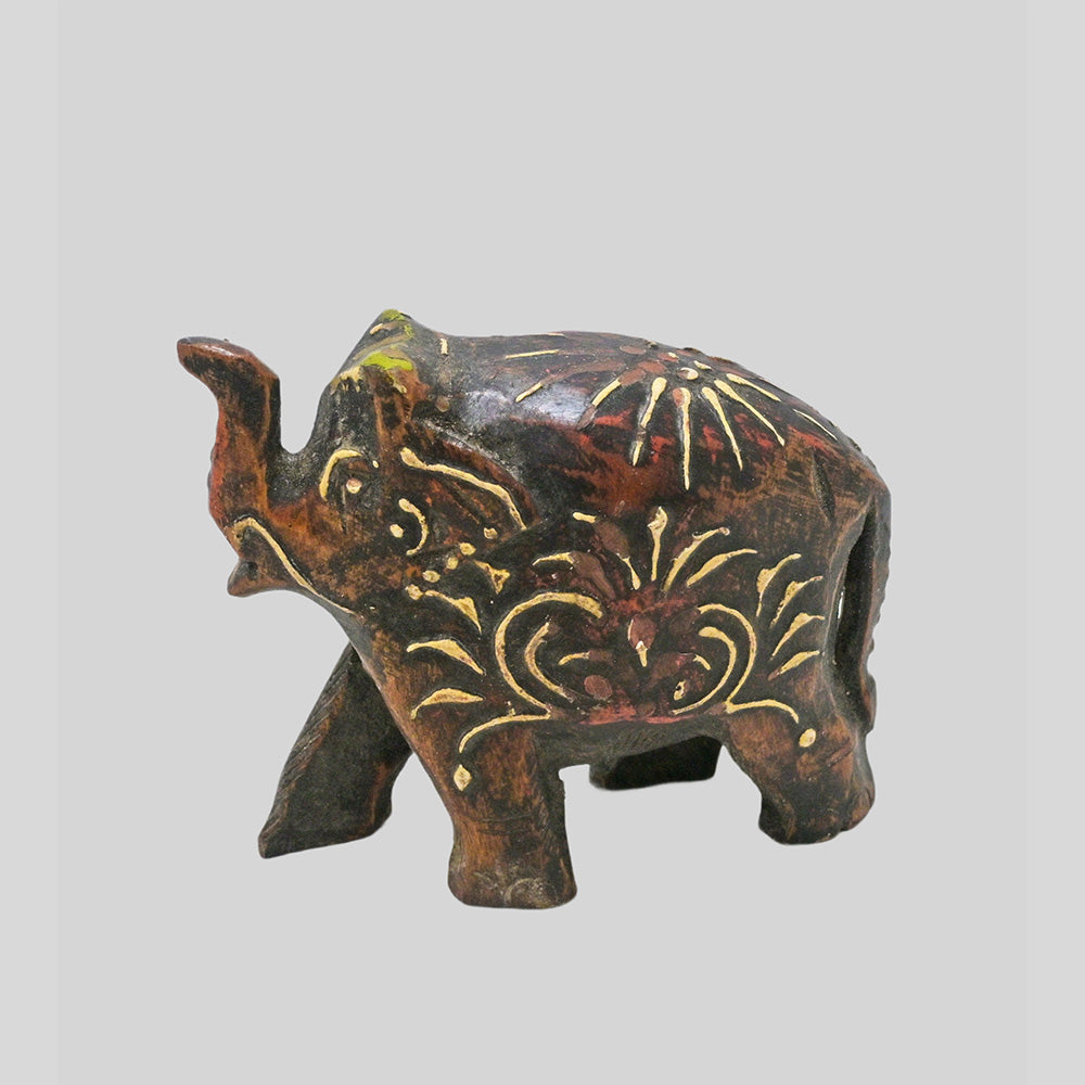 Hand-Painted Wooden Elephant Figurine with hand-painted folk-art patterns, side view