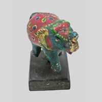 Multicolour Wooden Elephant Folk Art Figurine with hand-painted folk-art patterns, angled view