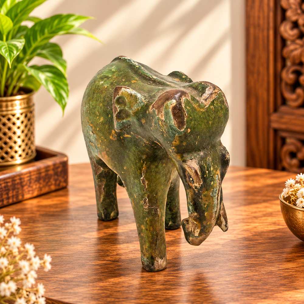 Vintage handcrafted wooden elephant figurine