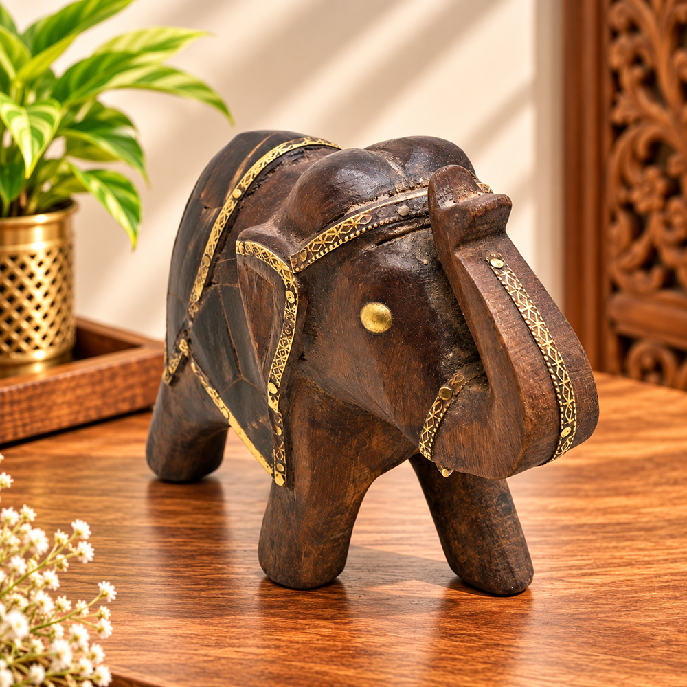 Vintage wooden elephant figurine with decorative brass work