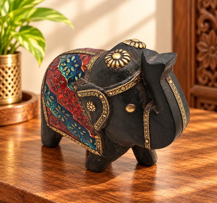 Handcrafted wooden elephant with floral hand painting and brass details