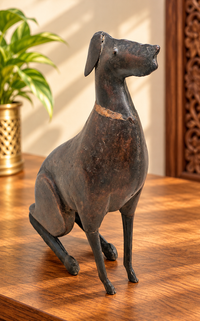 wooden and iron dog figurine, front view