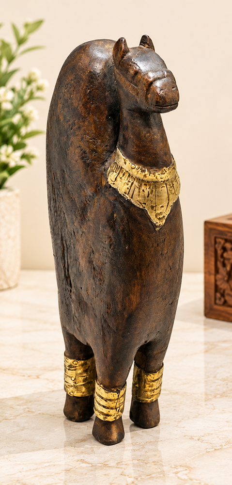 Handcrafted wooden folk camel figurine with brass decoration