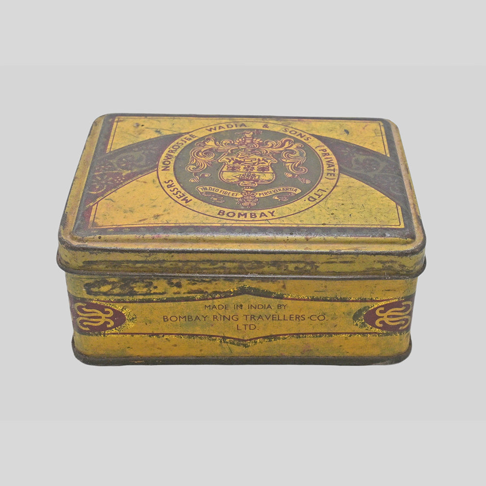 Vintage Bombay Ring Travellers Co. printed iron box, angled view
