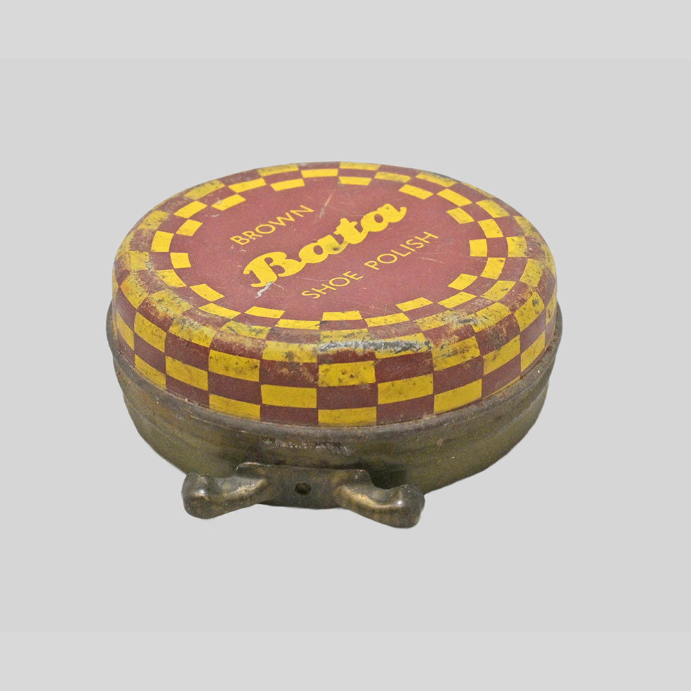 Vintage brown Bata shoe polish printed iron box, side view