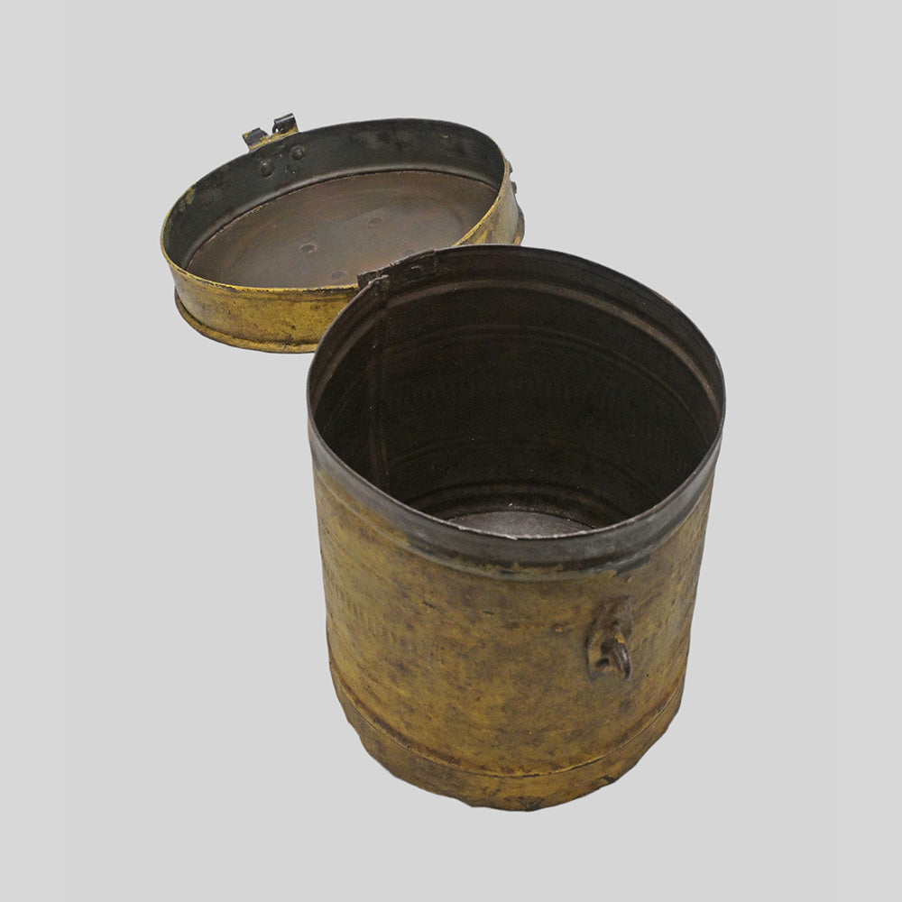 Vintage handcrafted iron storage canister with lid and latch, alternate view