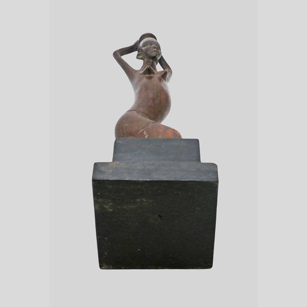 Vintage hand-carved wooden tribal figurine inspired by African art, additional view
