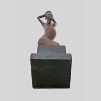 Vintage hand-carved wooden tribal figurine inspired by African art, additional view