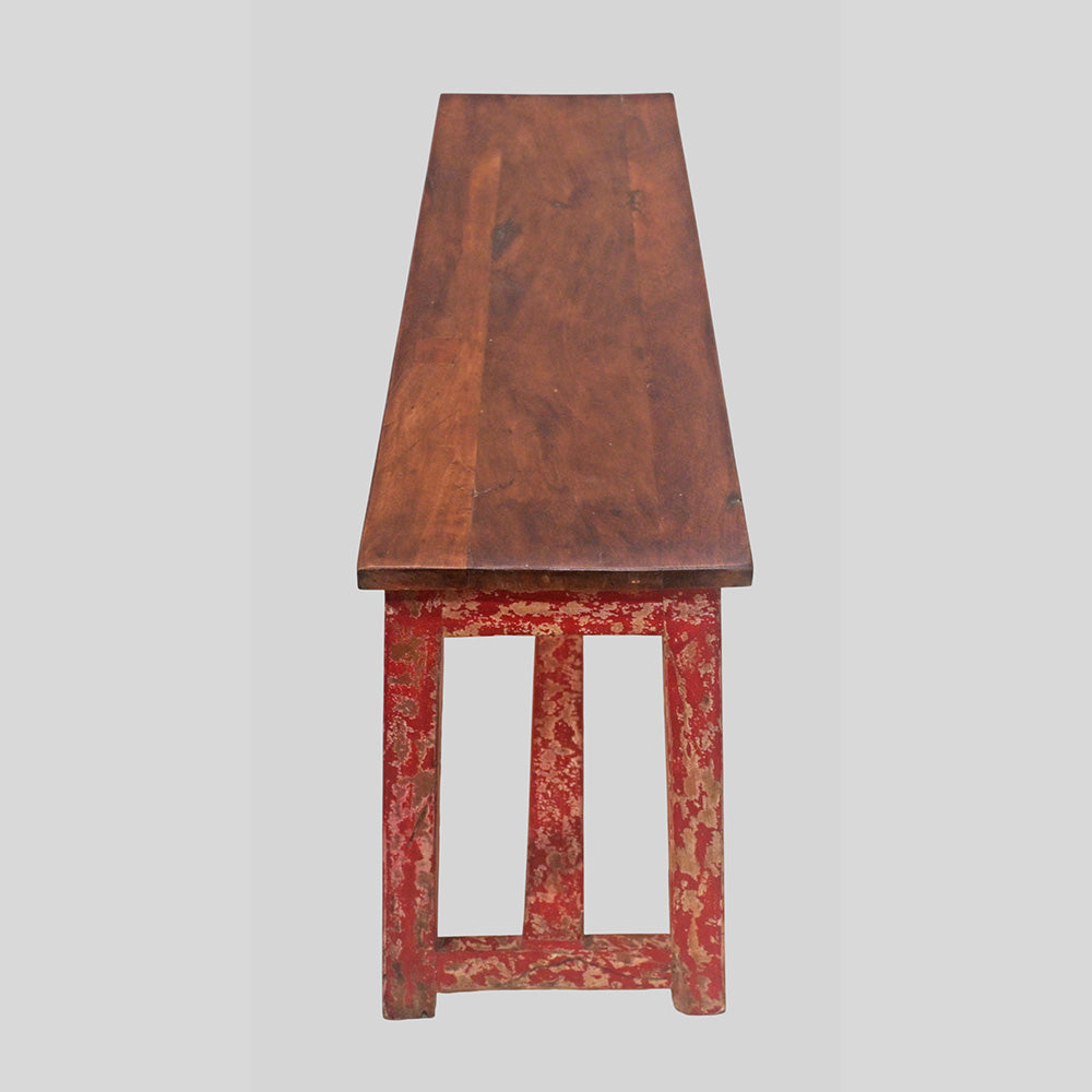 Vintage handcrafted long wooden bench with distressed red finish, alternate view
