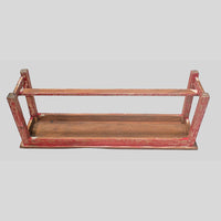 Vintage handcrafted long wooden bench with distressed red finish, additional view