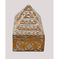 Handcrafted tribal wooden jewelry box with pyramid lid and carved details, close-up detail