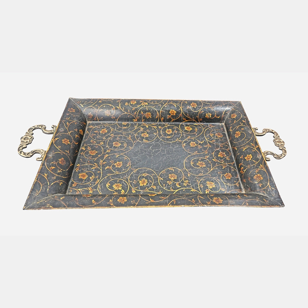 Close-up of painted floral detailing on iron serving tray