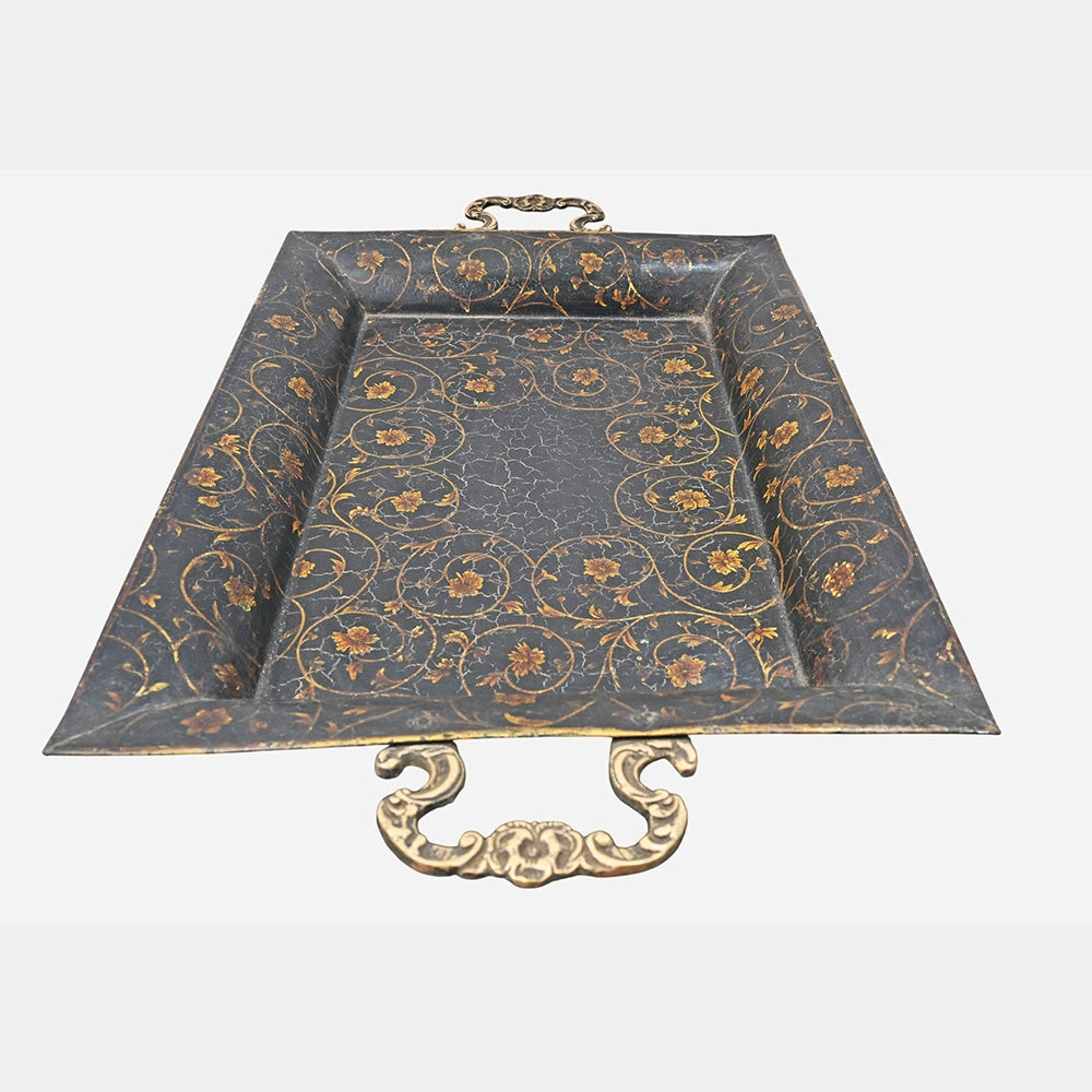 Side view showing brass handles on serving tray