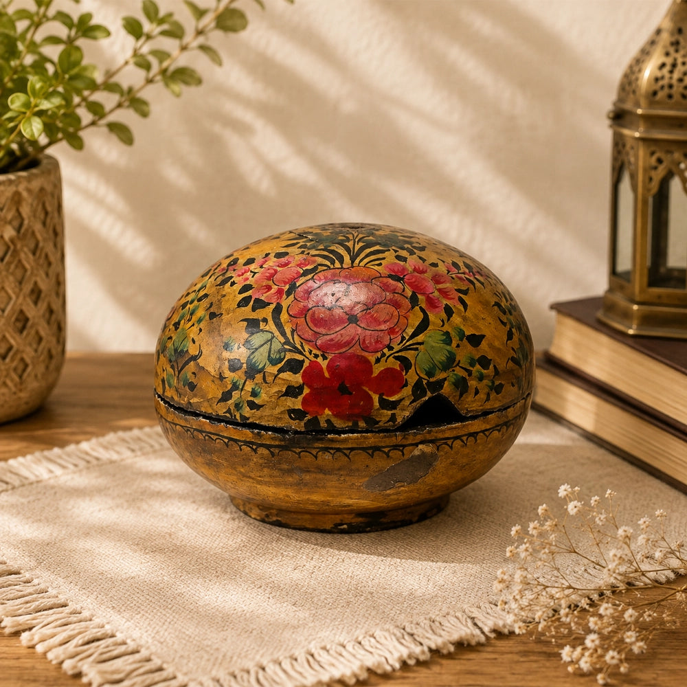 Antique papier-mâché box with floral artwork, front view