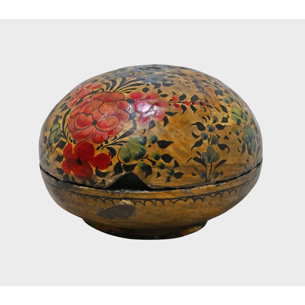 Close-up of floral artwork on papier-mâché box