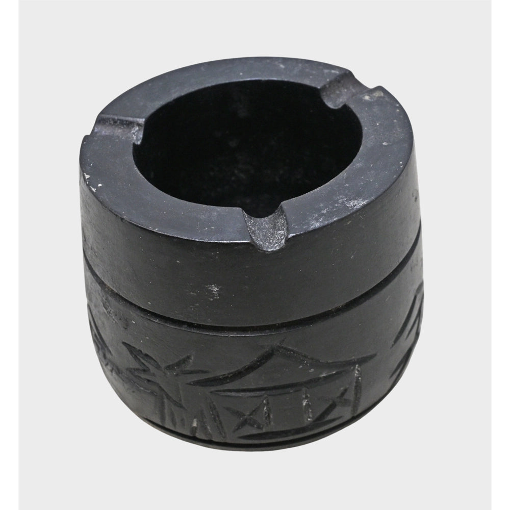 Black stone cigar ash holder showing carved form, second view