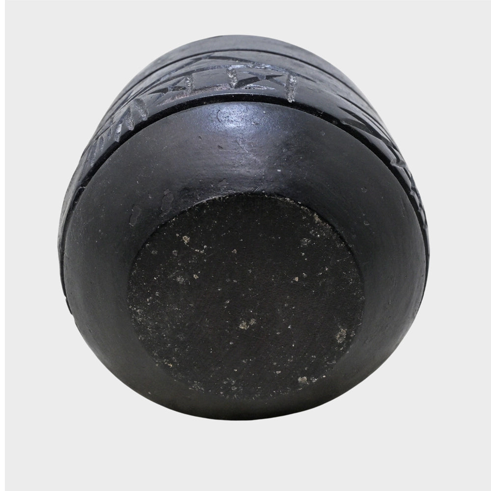 Black stone cigar ash holder showing its shape, alternate view