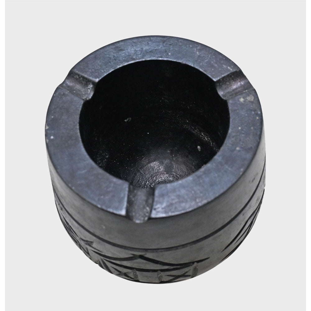 Hand-carved black stone cigar ash holder, detail view