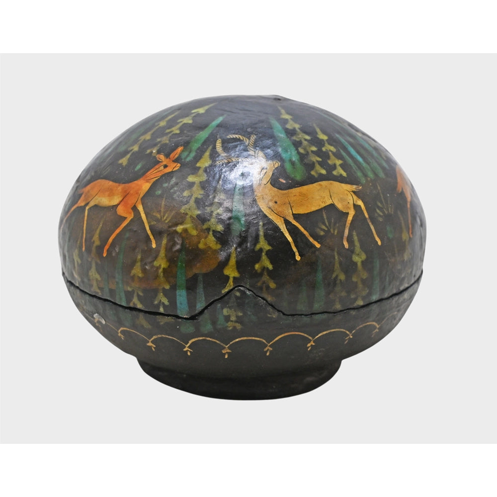 Close-up of painted deer artwork on papier-mâché storage box
