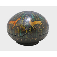 Close-up of painted deer artwork on papier-mâché storage box