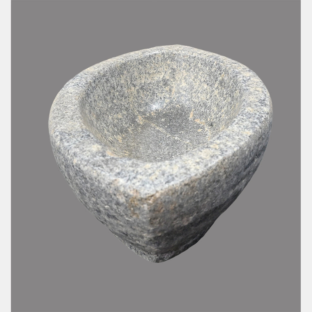 Close-up of large white marble grinding bowl