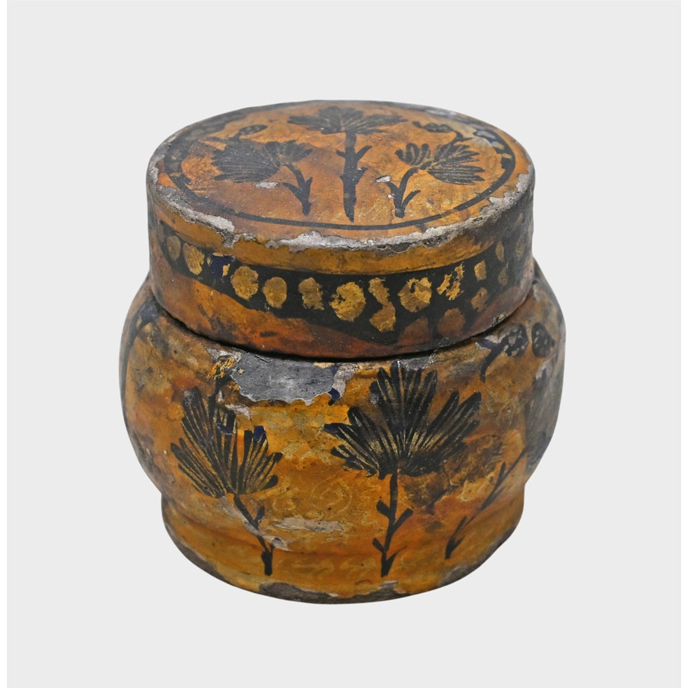 Close-up of hand-painted floral design on box