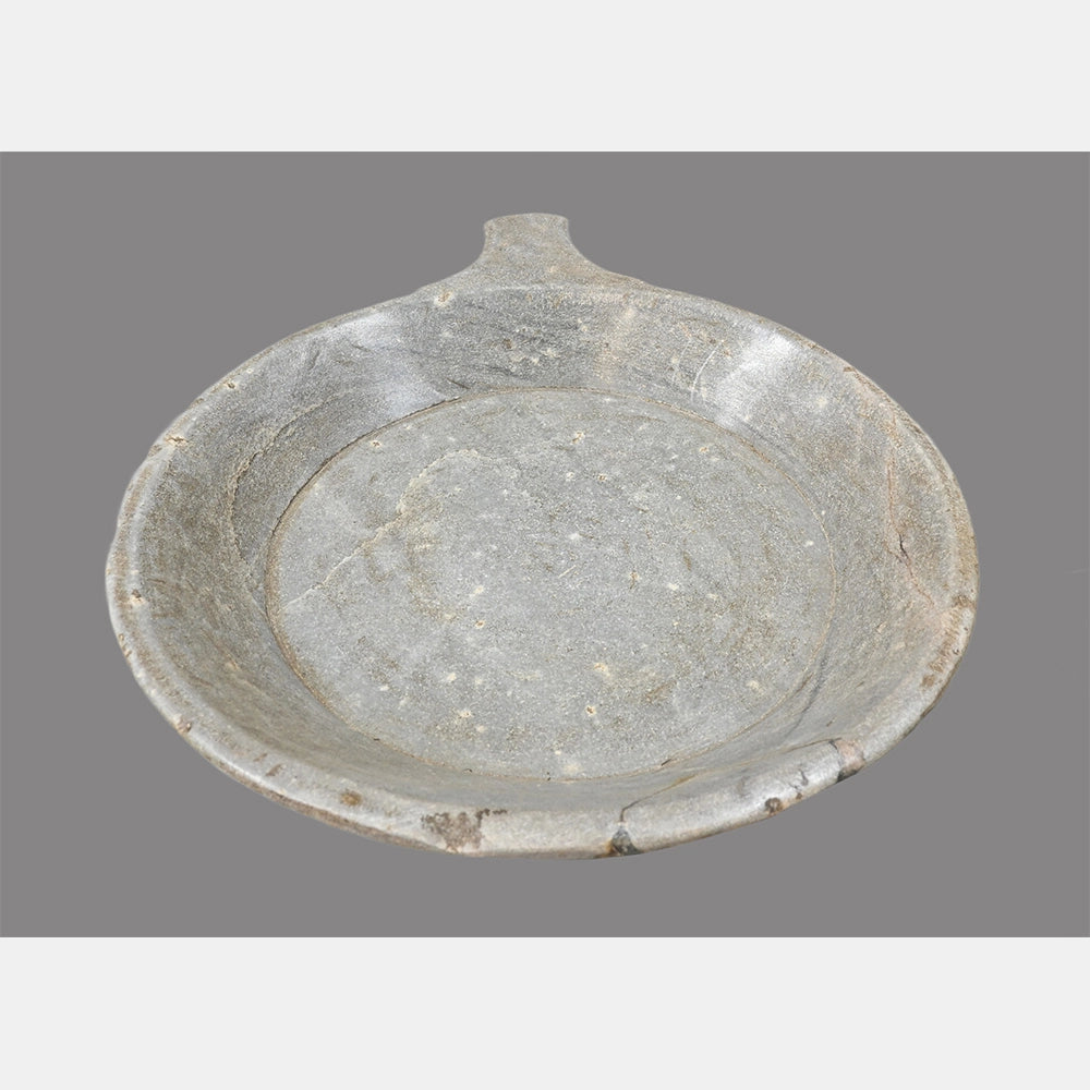 Close-up of handcrafted marble bird bath bowl