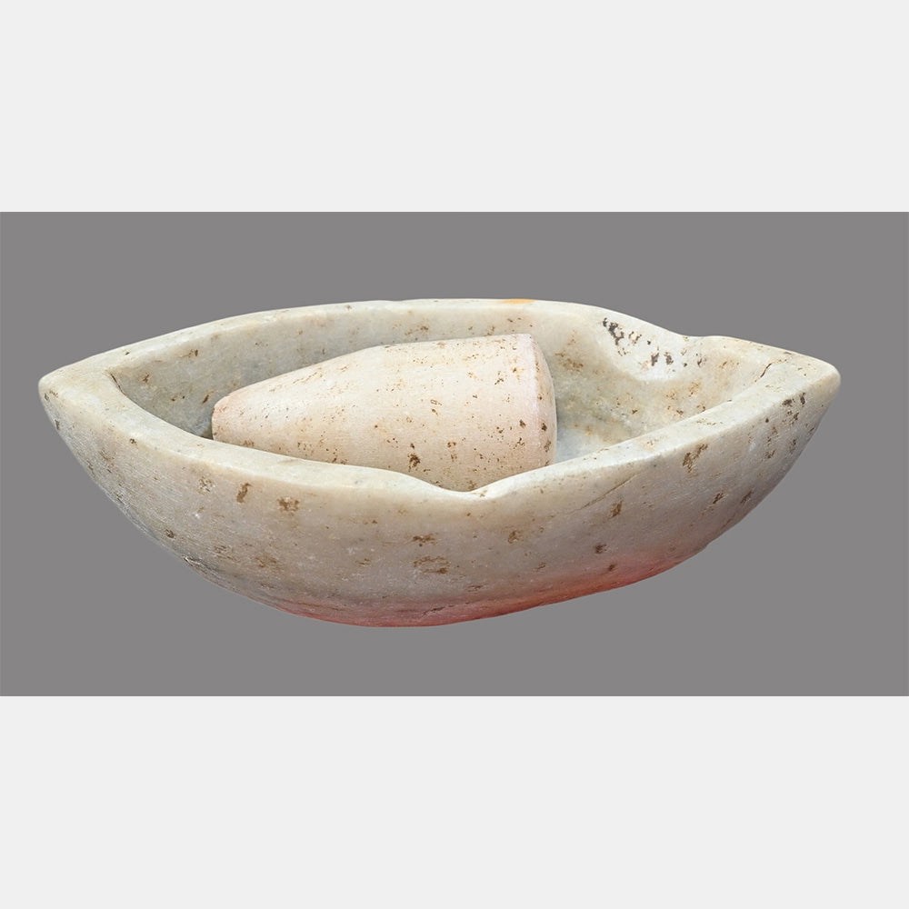White marble mortar and pestle, side view