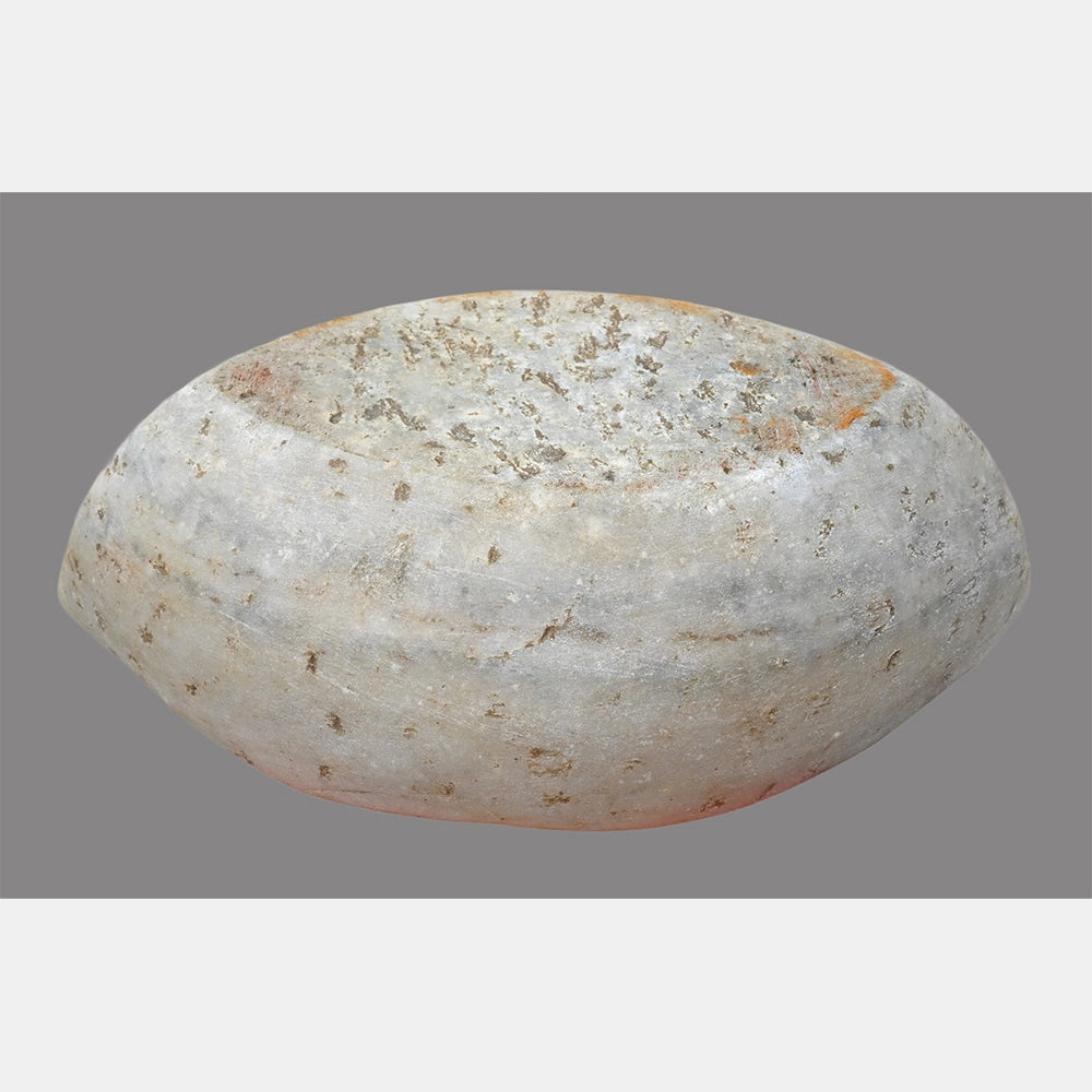 White marble mortar and pestle showing natural stone finish