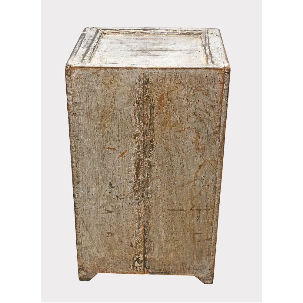 Distressed finish on handcrafted wooden drawer chest