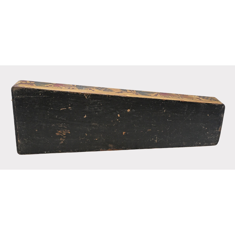 Vintage wooden storage chest showing side details