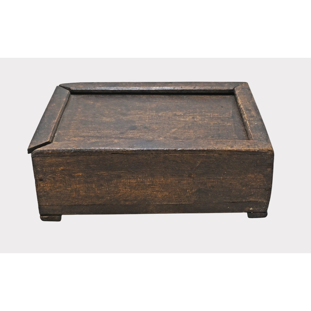 Wooden spice box showing lid and compartments, angled view