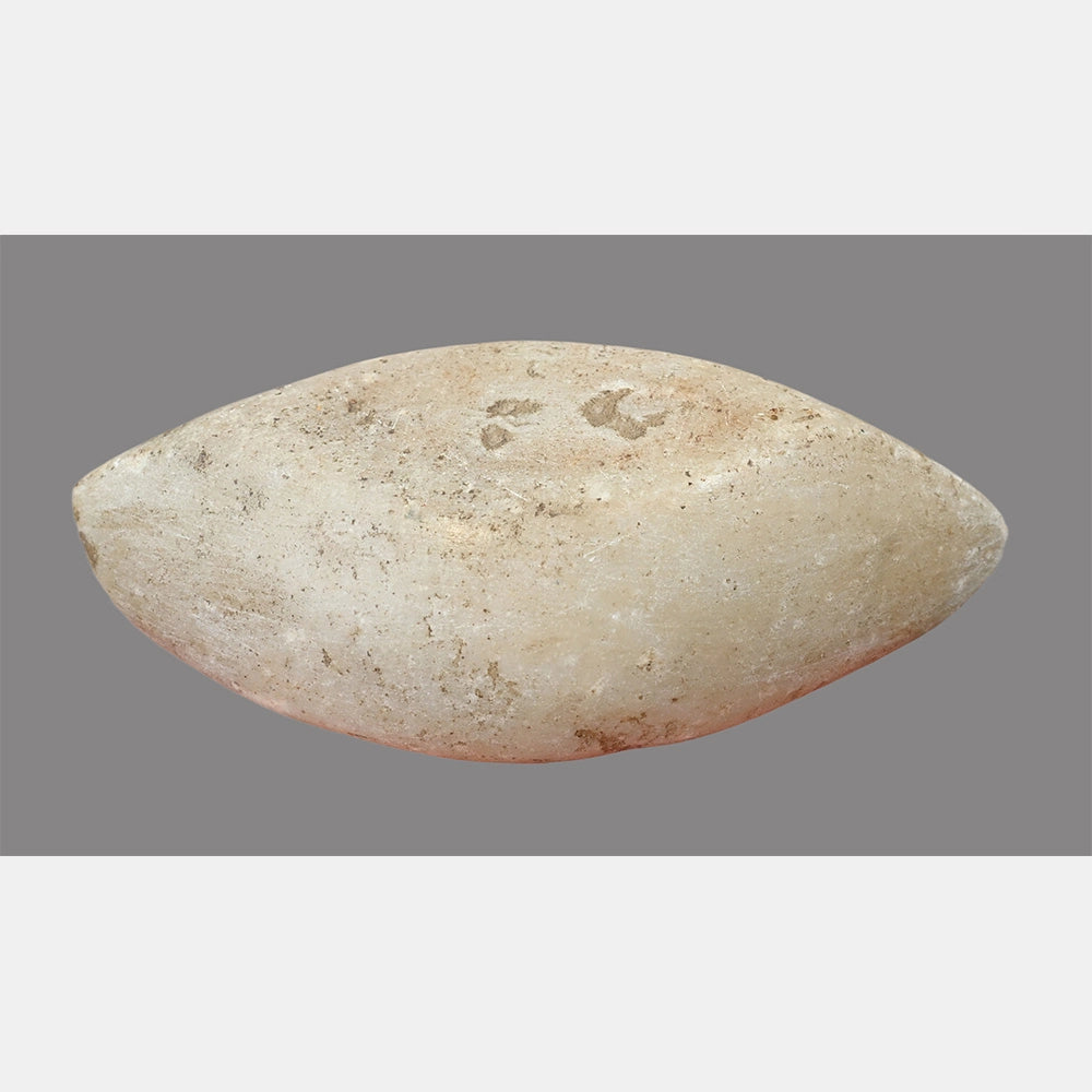 Angled view of marble Karal spice grinding bowl