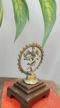 Vintage Handcrafted Brass Dancing Lord Shiva with Prabhamandala on Wooden Bajot Base - 2026091918UNQ