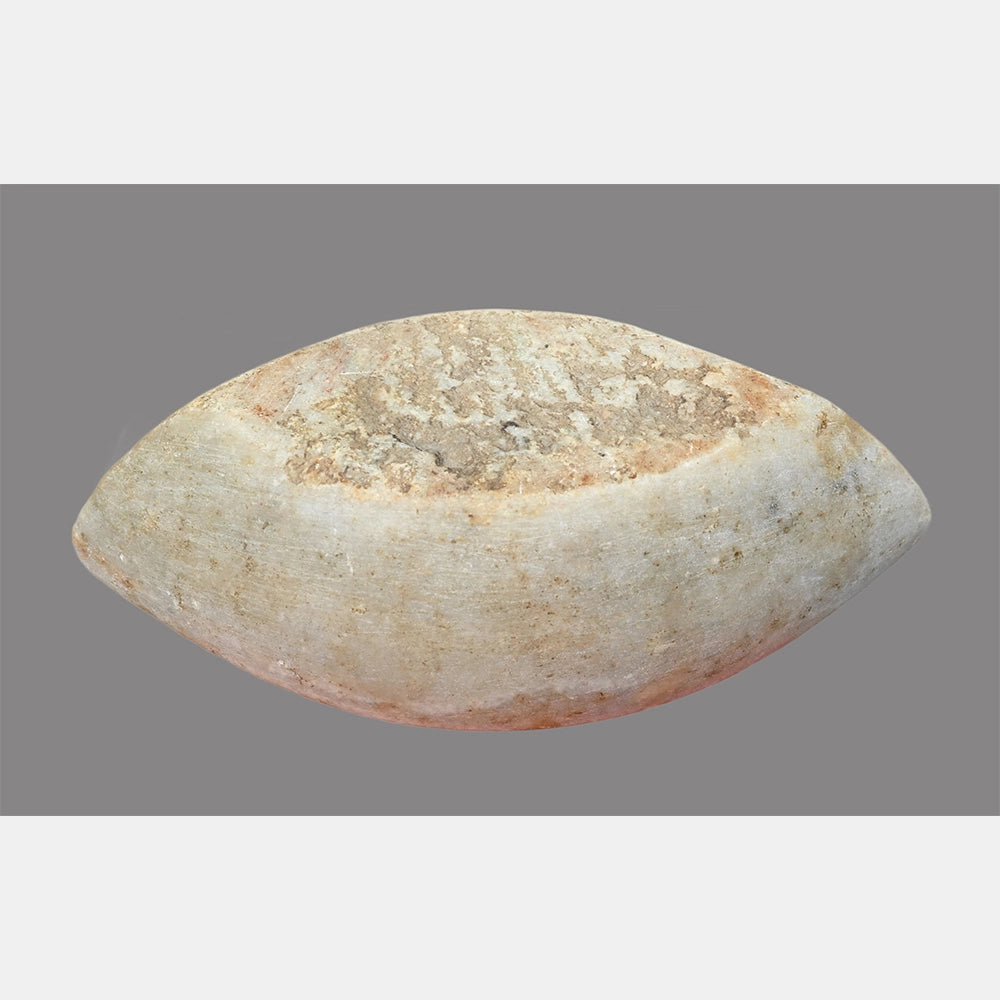 Angled view of white marble Karal grinding bowl