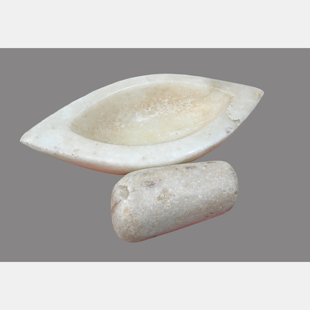 Close-up of handcrafted marble mortar and pestle