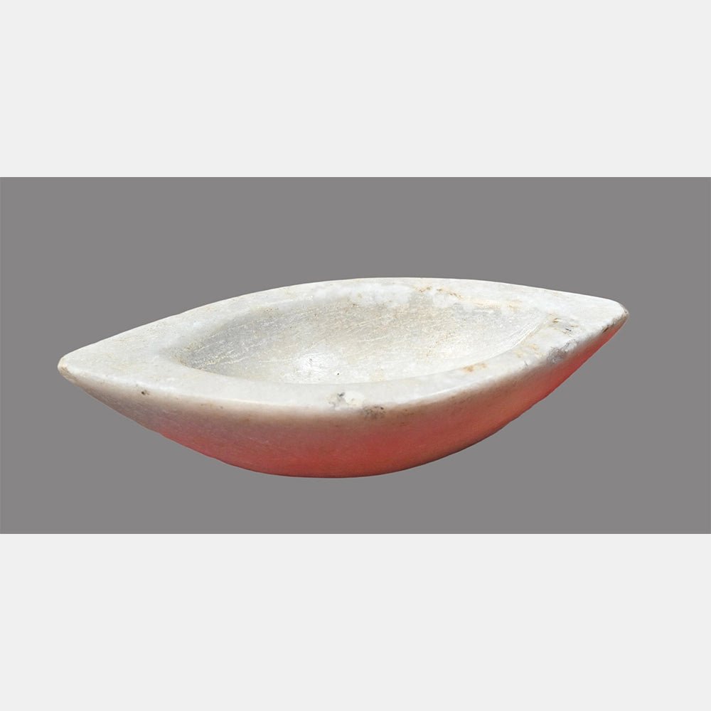 Angled view of handcrafted rustic marble Karal bowl